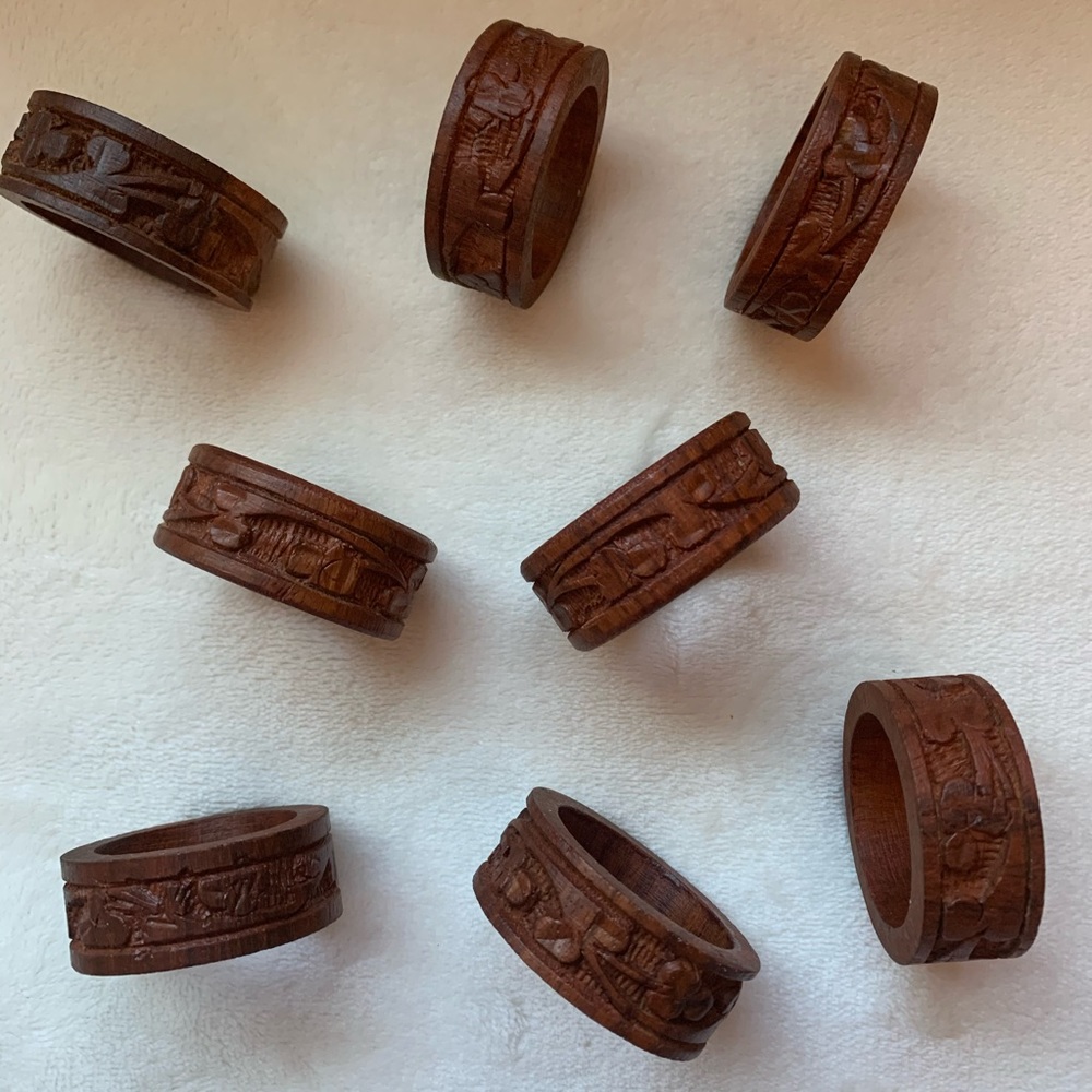 8 teakwood carved napkin rings